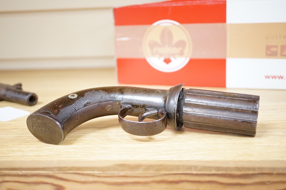 A six shot 120 bore self-cocking percussion pepperbox revolver with fluted barrels, Birmingham proof, rounded foliate engraved frame, and two-piece chequered walnut grips